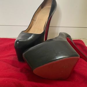 Christian Louboutin red bottoms